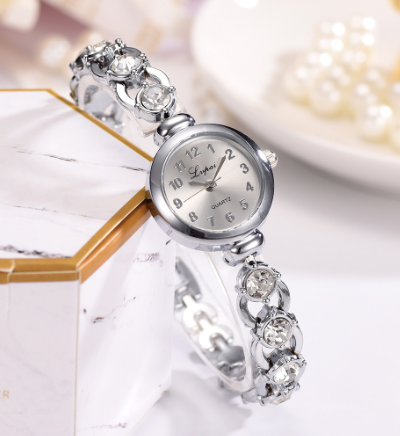 Montre métal femme avec pierres du Rhin