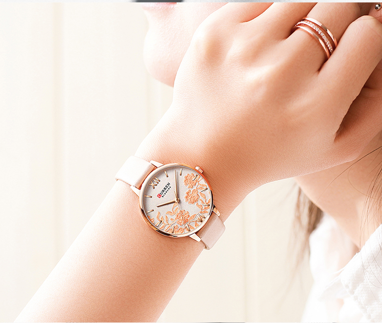 Montre Curren pour femme avec bracelet de cuir beige et cadran fleuri
