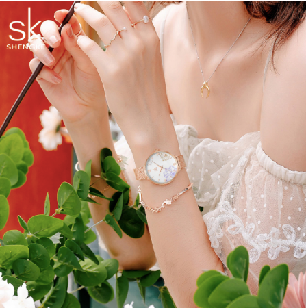 Montre Shengke en mesh or rose et cadran fleuri
