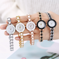 Montre métal pour femmes argent et noir