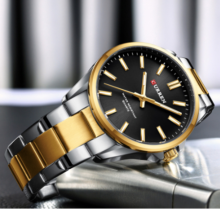 Montre Curren en métal deux tons or et argent, fond noir, pour hommes.