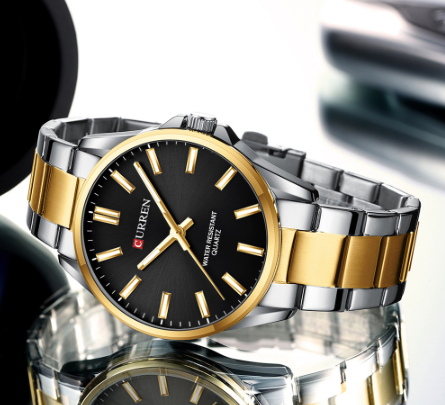 Montre Curren en métal deux tons or et argent, fond noir, pour hommes.